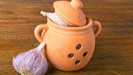 Why People Store Garlic In Those Covered Bowls