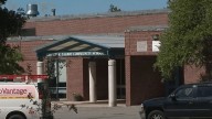 Unidentified police detain parent at Maine elementary school