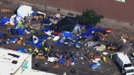 Minneapolis clears encampment after mass shooting injures 8
