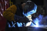 AI could help manufacturers offset tariff costs, depending on implementation: experts