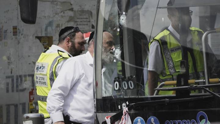 Palestinian gunmen kill 6 people in attack on Jerusalem bus stop