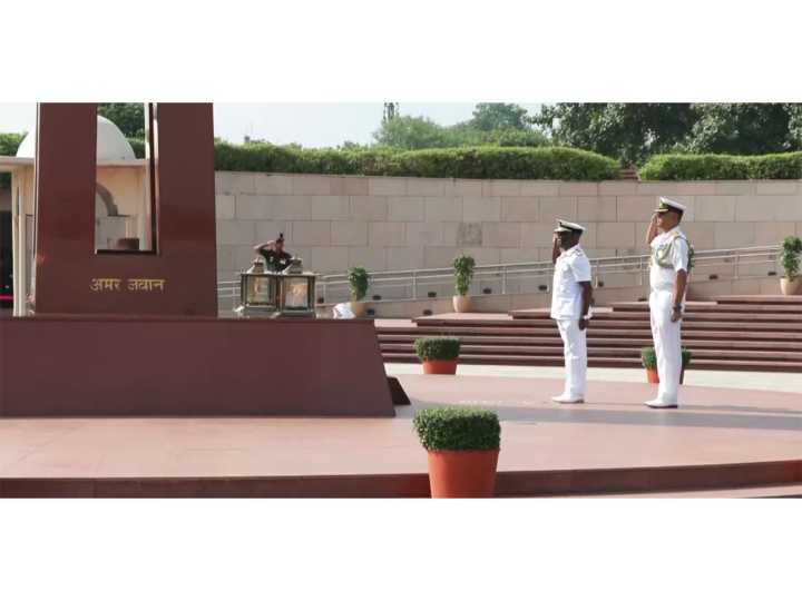 Kenya's Navy Commander Major General Paul Owuor Otieno pays tributes at the National War Memorial