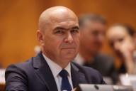 Romanian coalition government survives multiple no confidence votes over deficit cuts
