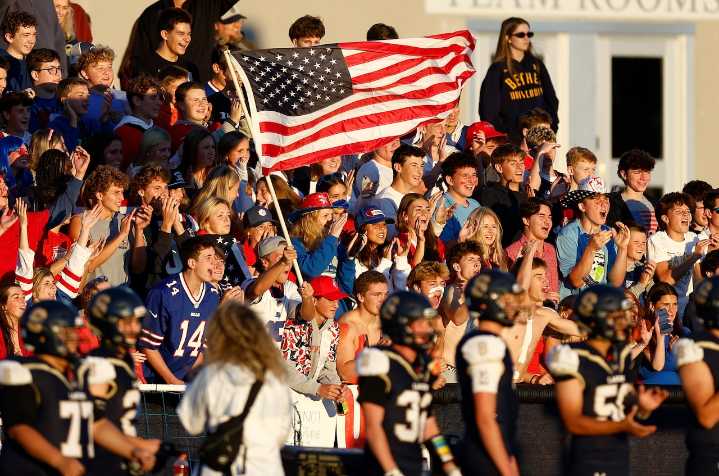 Skaneateles students storm field after kicker nails game