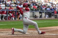 Phillies beat Brewers 2-0 behind Suárez's 6 shutout innings
