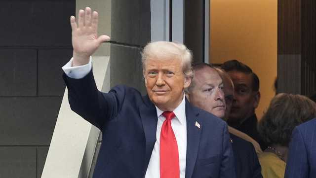 Trump attends the US Open as Rolex's guest despite Swiss tariffs. Mixed cheers and boos greet him
