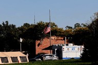 American flag at half-staff stands as powerful image after Michigan church mass killing