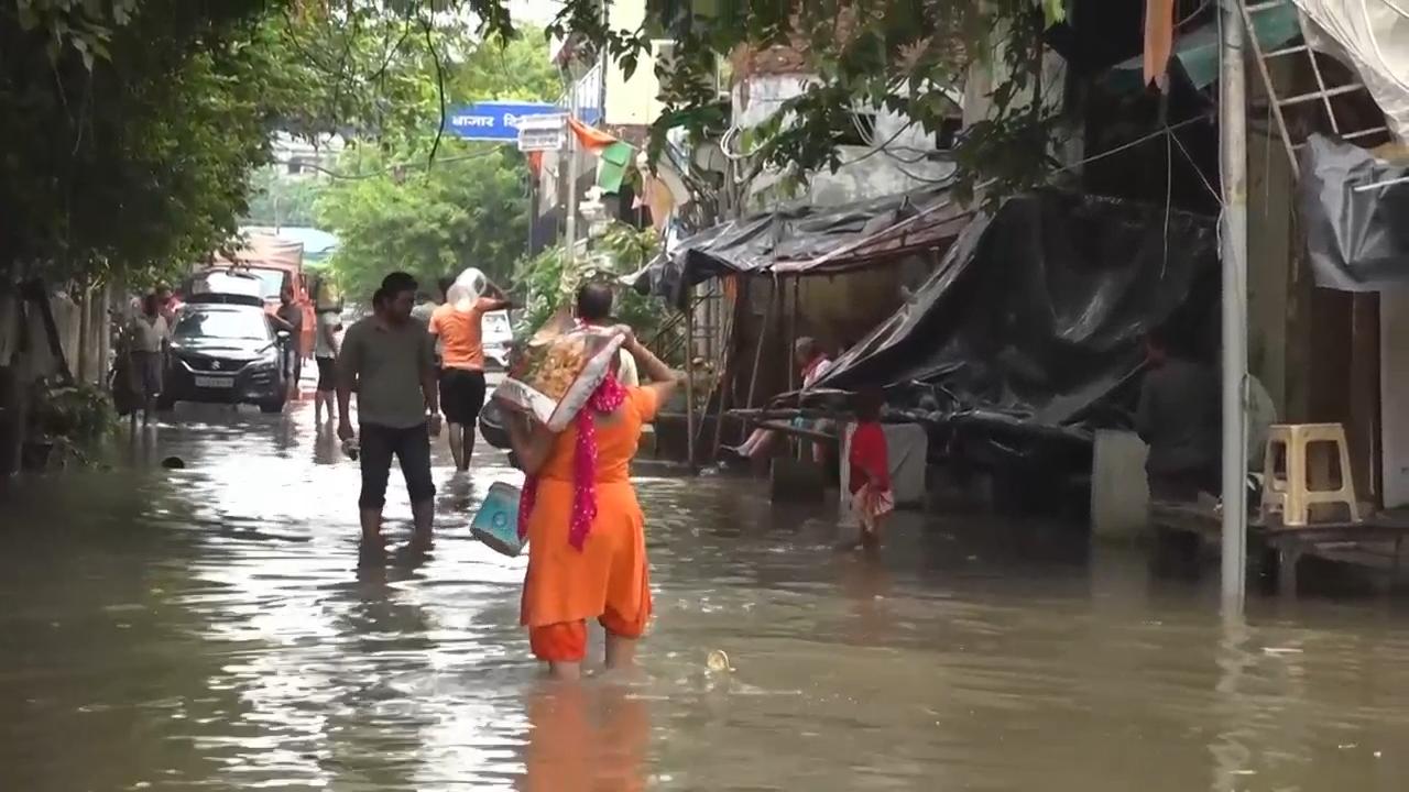 New Delhi family seeks relief from some of the worst floods to hit northern India in decades
