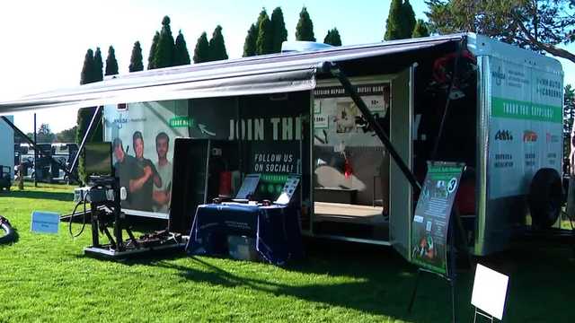 NH Automobile Dealers Association unveils experiential trailer at golf fundraiser