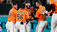An out from being no-hit, Orioles stun Dodgers with 4 runs in the 9th to win