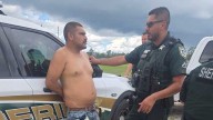 Man turns self in after arrest warrant issued in Volusia County
