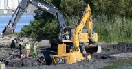 Photos/video: City excavator stuck in Port Colborne’s Eagle Marsh Drain