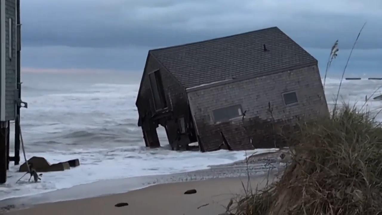 Another beachfront stilt house collapses into the surf on the Outer Banks