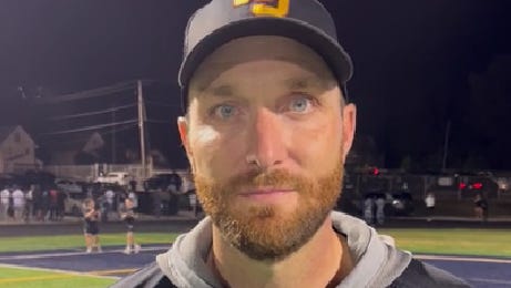 Walsh football coach Nick Alexander talks after Hoban game