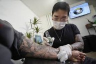 South Korean parliament votes to allow  tattooists to work without medical license
