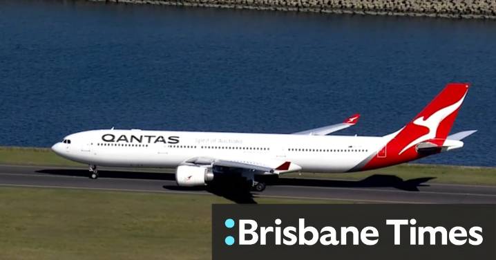 Qantas suspends all flights to Hong Kong as a typhoon barrels towards the region