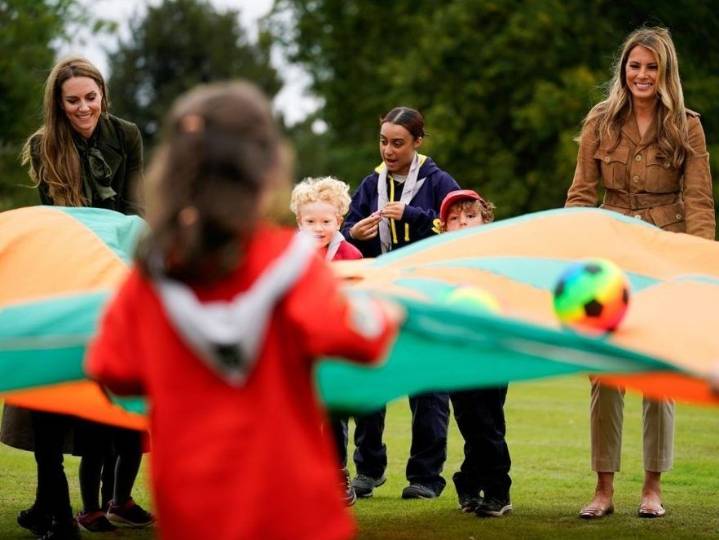 All smiles as Melania and Kate meet kids in first public event