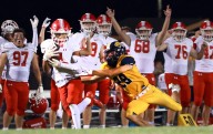 Football: Naperville Central's Mark Williams arrives