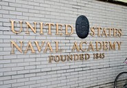 What happens at the Naval Academy during a shutdown?