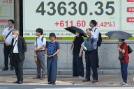 Asian shares rise after Japan's prime minister resigns