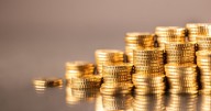 Gold prices are near a record high. Here's why experts say it's worth investing in anyway.