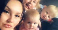 Man accused of murdering mum and three kids in fire dies in custody