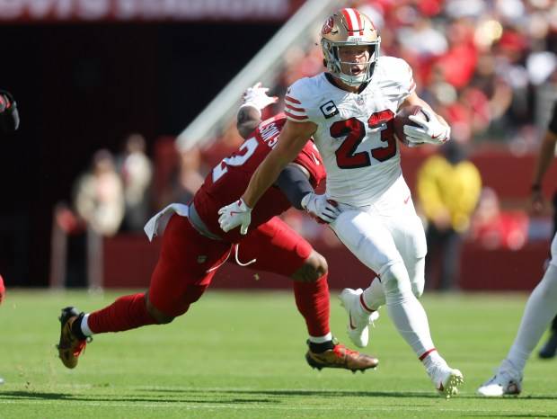 49ers’ McCaffrey takes a licking and keeps on ticking