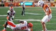 Texas QB Arch Manning stares down Sam Houston defender after rushing touchdown