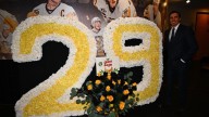Penguins install flower decorations for Fleury