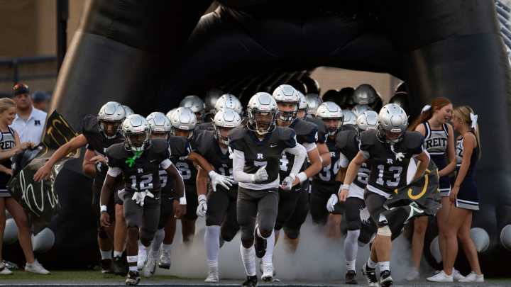 PHOTOS: North and Reitz do battle on the football gridiron