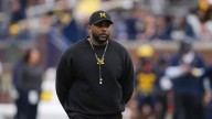 Michigan coach Sherrone Moore says Biff Poggi will lead team during his upcoming 2