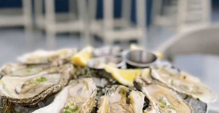 Coral Gables' First Rooftop Bar Reopens With Raw Bar, Tapas