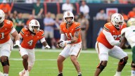 USF's Byrum Brown, Miami's Carson Beck each intercepted, ending long streaks without a pick