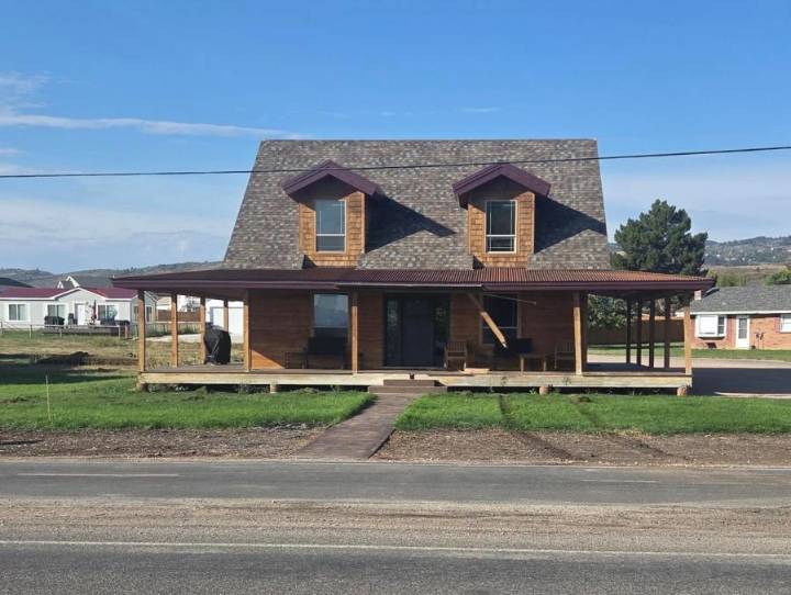 Suspect at large after crashing into Rich County home