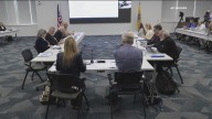 Kennedy's vaccine advisers decline to recommend COVID