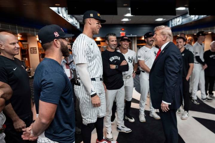 Trump visits Yankees clubhouse, attends game on 24th anniversary of 9/11