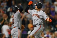 Chapman homers twice as Giants set SF-era home run record, sweep Rockies