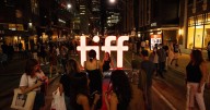 Prime Minister Mark Carney takes stage at TIFF's opening night, honours John Candy