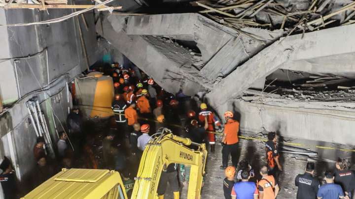 65 feared trapped, at least 1 dead in Indonesia school building collapse