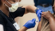 Illinois health officials recommend COVID-19 vaccine for all adults, contradicting feds