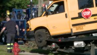 School bus crashes into house after collision near 76th and Thurston
