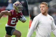 49ers' Christian McCaffrey 'plans to play' despite missing practice with calf injury