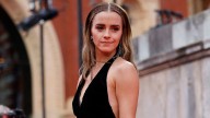 Emma Watson masters the mini dress in two standout looks during rare outing