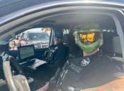 Commerce City police dress the part for Halloween costume giveaway