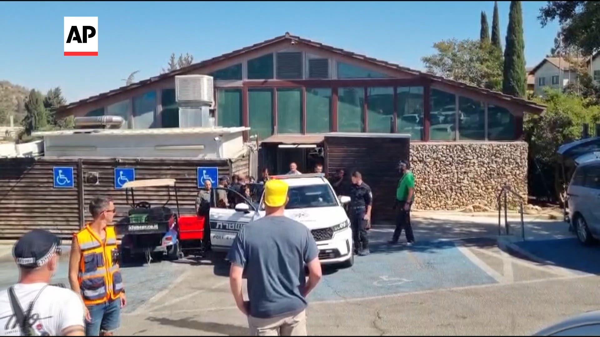 Israeli police says 2 people injured in suspected militant attack at hotel outside Jerusalem
