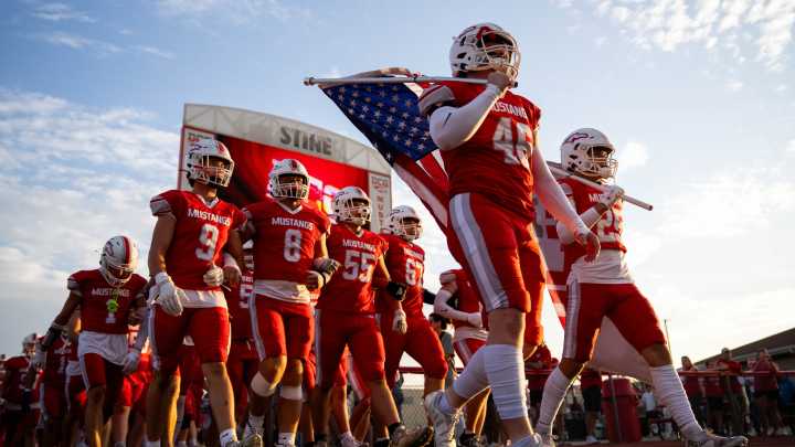 See photos of Dallas Center-Grimes vs Dowling Catholic football