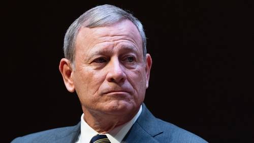 Chief Justice John Roberts keeps in place President Donald Trump funding freeze that threatens billions in foreign aid