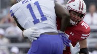 Inside the move of Wisconsin's Riley Mahlman to left tackle