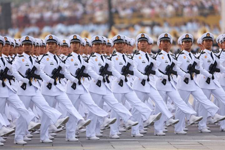 China’s Xi to hold lavish military parade in defiance of West