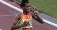 Kipyegon wins in a breeze for fourth world title at 1,500 meters